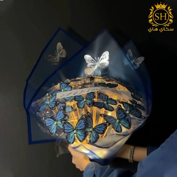 باقة فراشات مع اضاءة لون ازرق